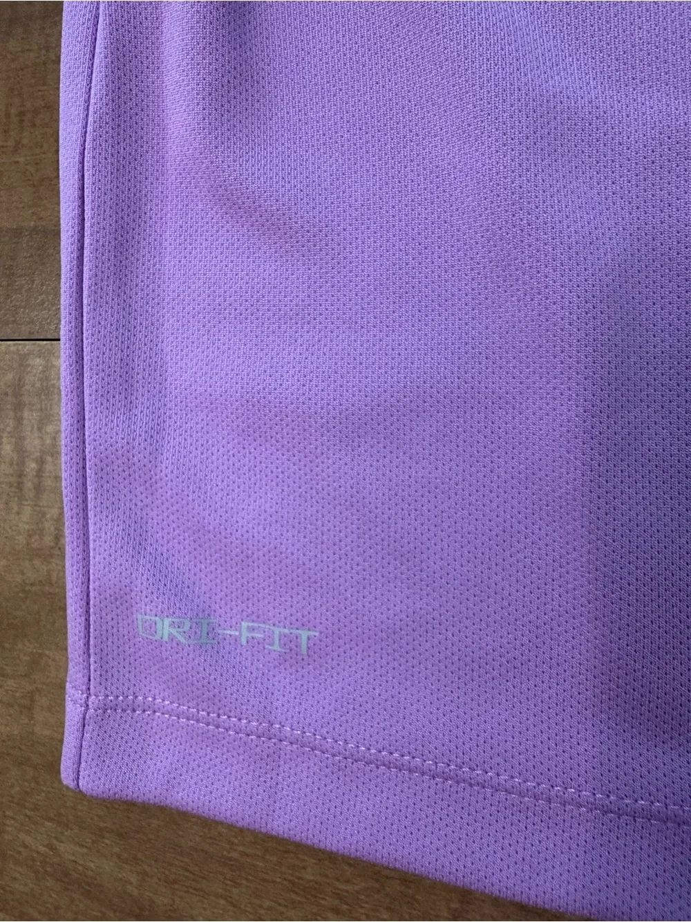 Nike Girls Short Sleeve Tee in Lavender with White Swoosh